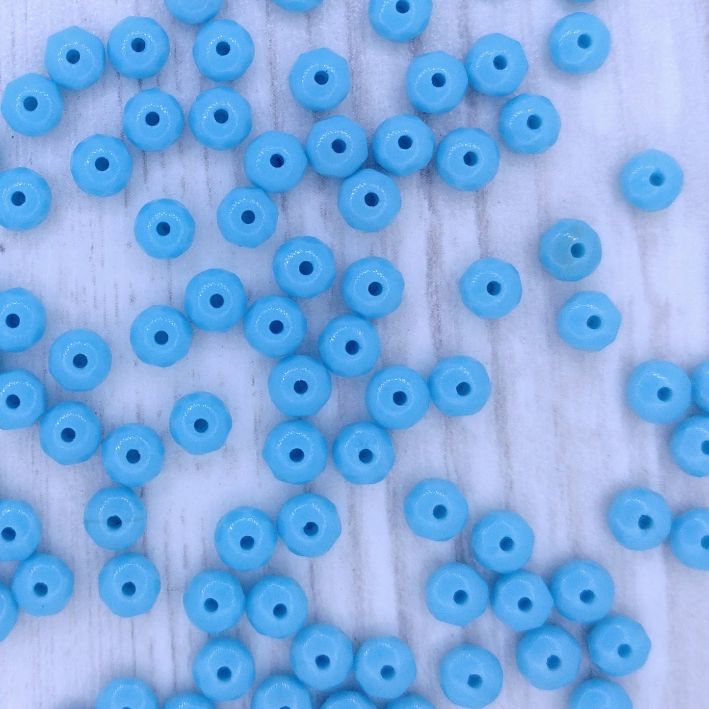 25 x faceted rondelles in Light Turquoise (2x3mm)