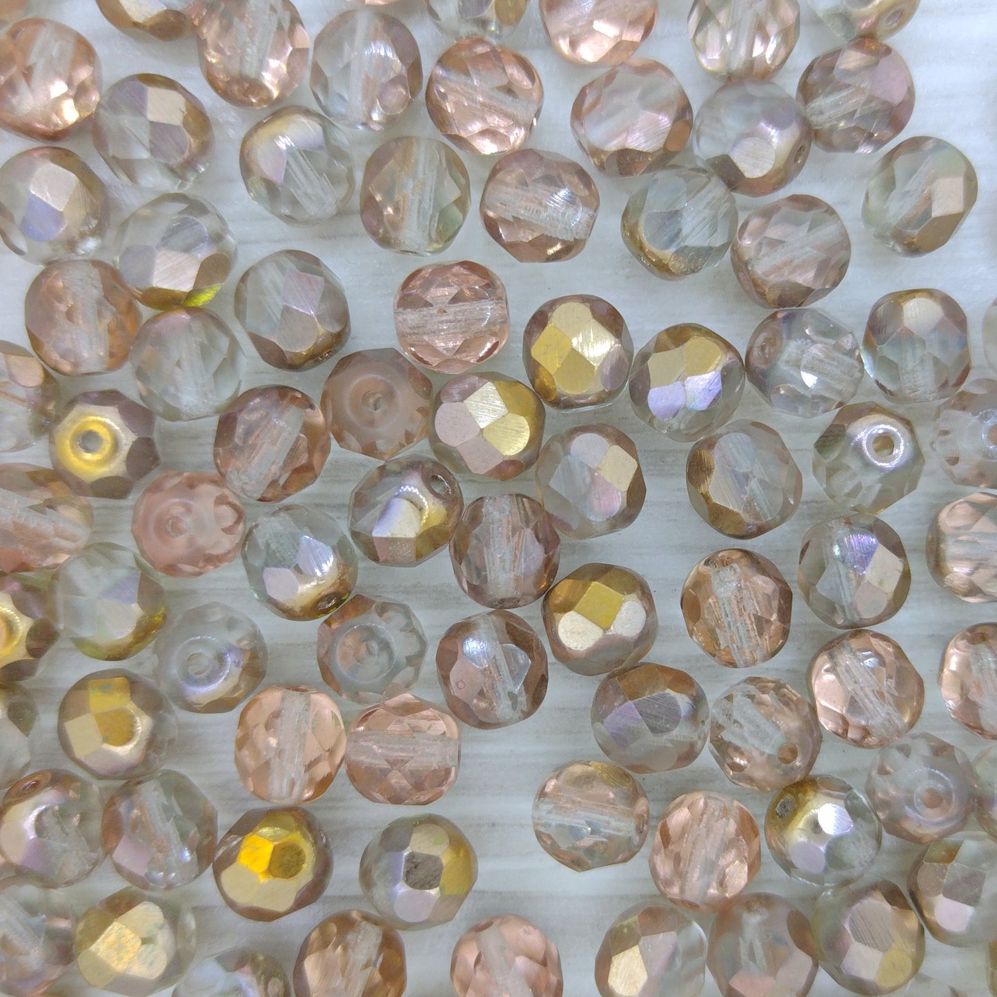 25 x 7mm faceted beads in Smokey Grey Copper