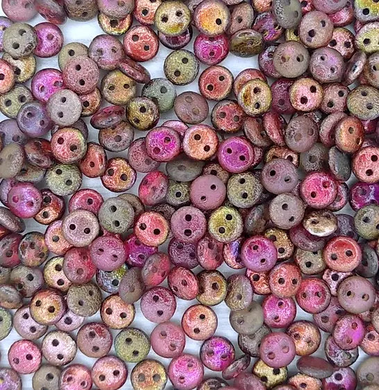 50 x two hole lentils in etched Magic Wine