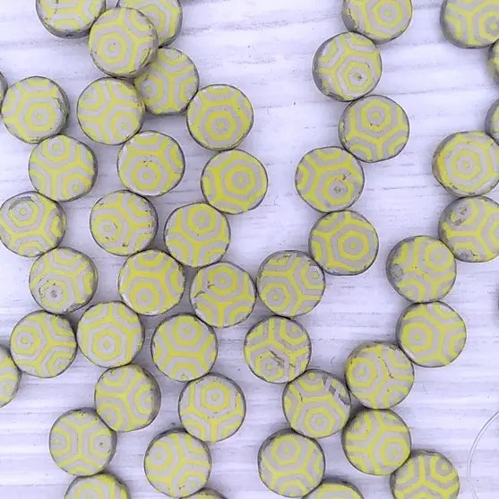 20 x 8mm discs with 2 holes in Matt Yellow with laser etched Medium Hexagons
