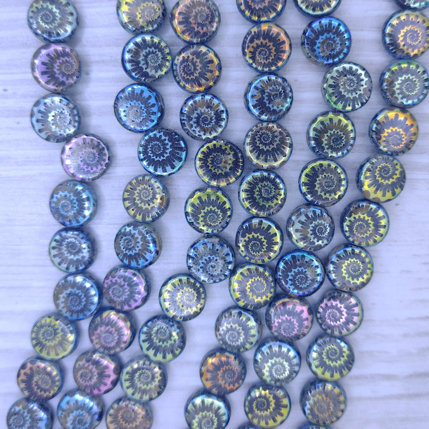 25 x 8mm disc bead in Grey Picasso with laser etched shell