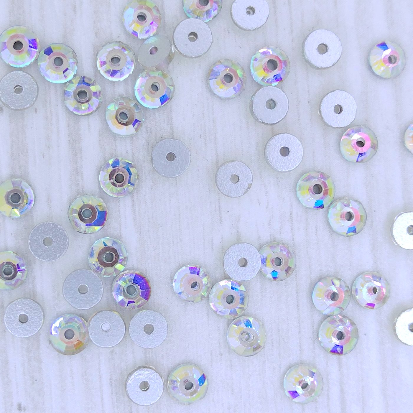 4mm Sequin or Rose I hole in Crystal AB (Aurora)