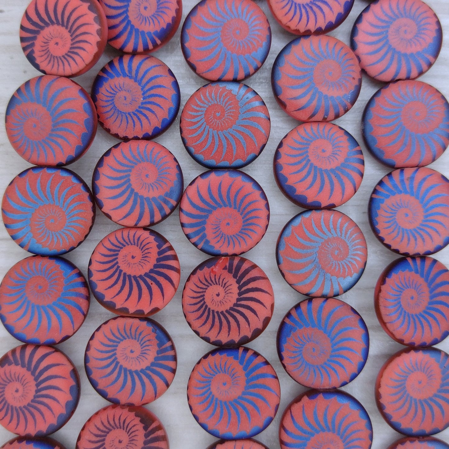 8 x 14mm disc beads in Matt Dark Red with laser etched Shell