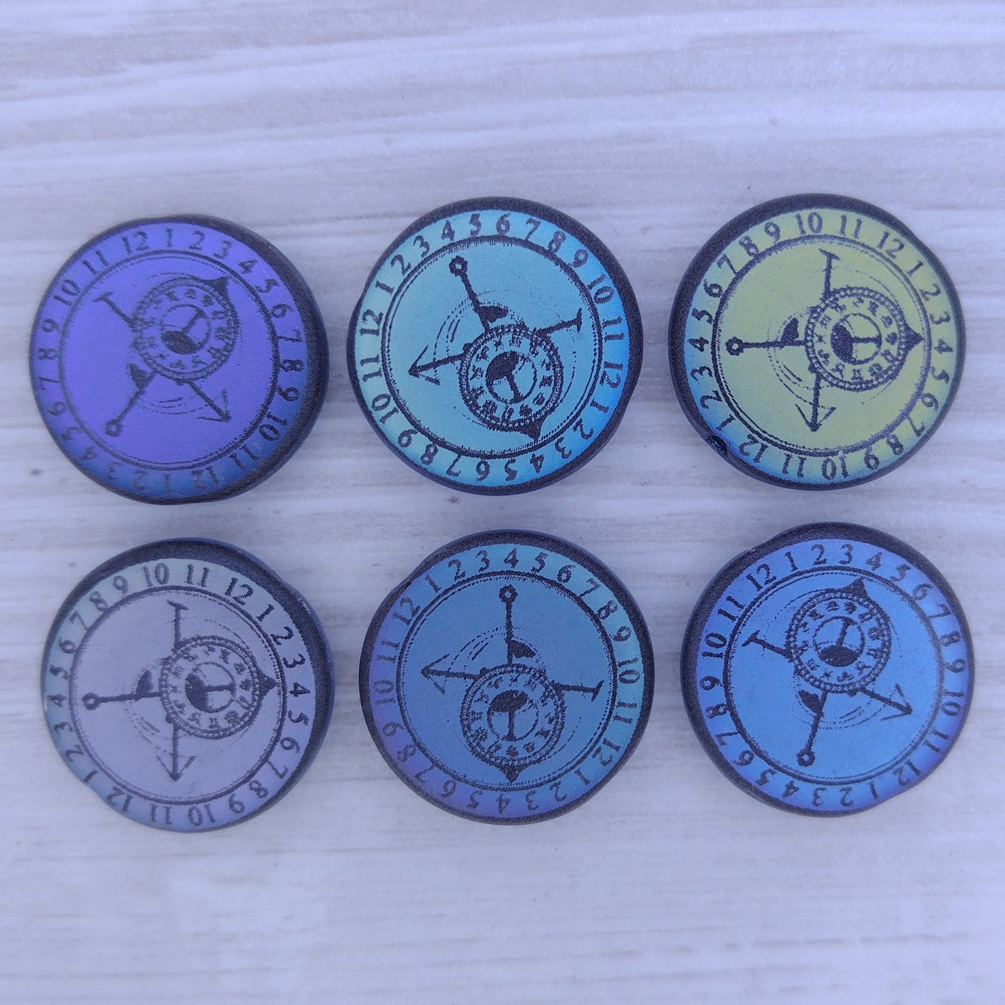 4 x 17mm disc beads in Matt Black with laser etched Clock 2