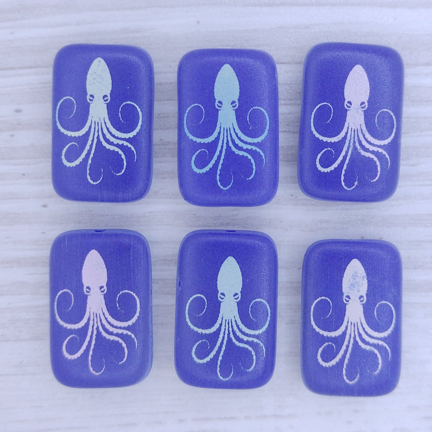 4 x rectangular beads in Matt Dark Blue with laser etched Octopus (18x12mm)