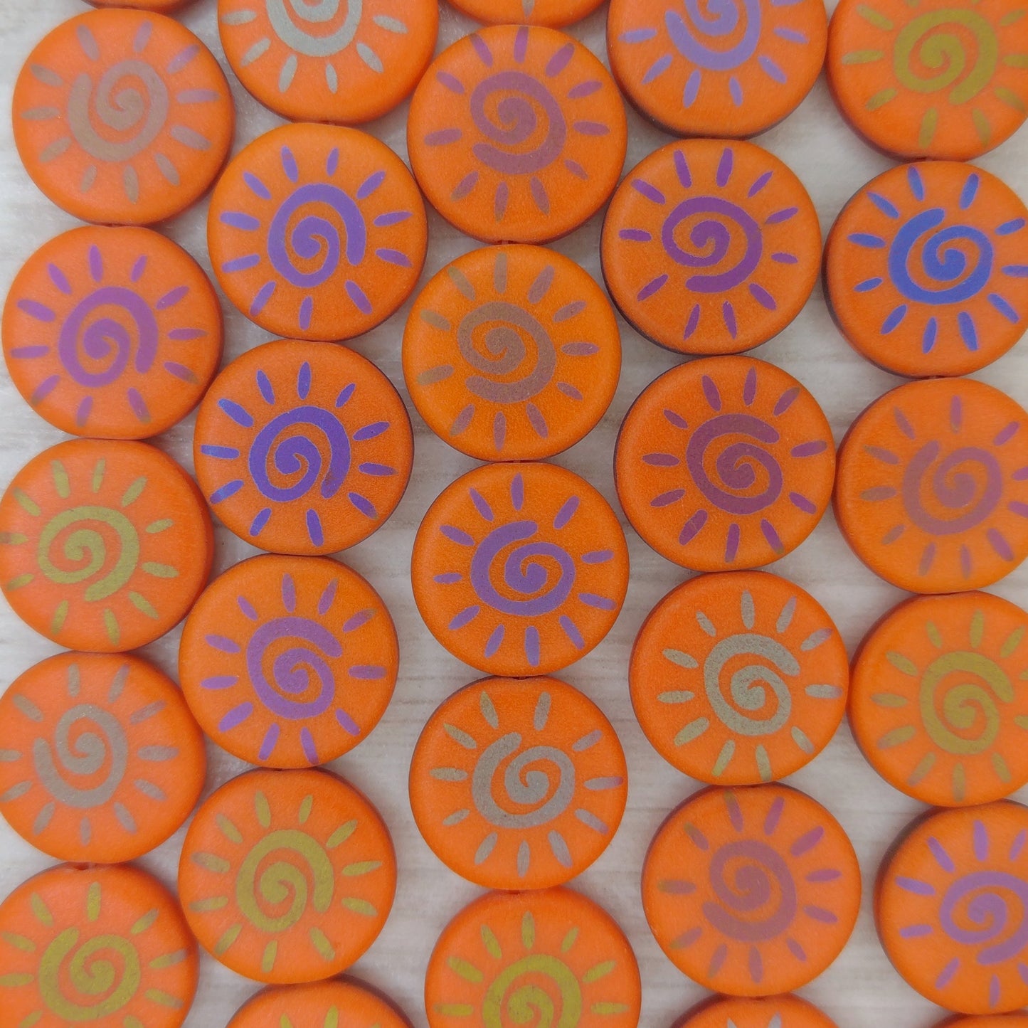 8 x 16mm discs in Matt Orange with laser etched Dark Sun