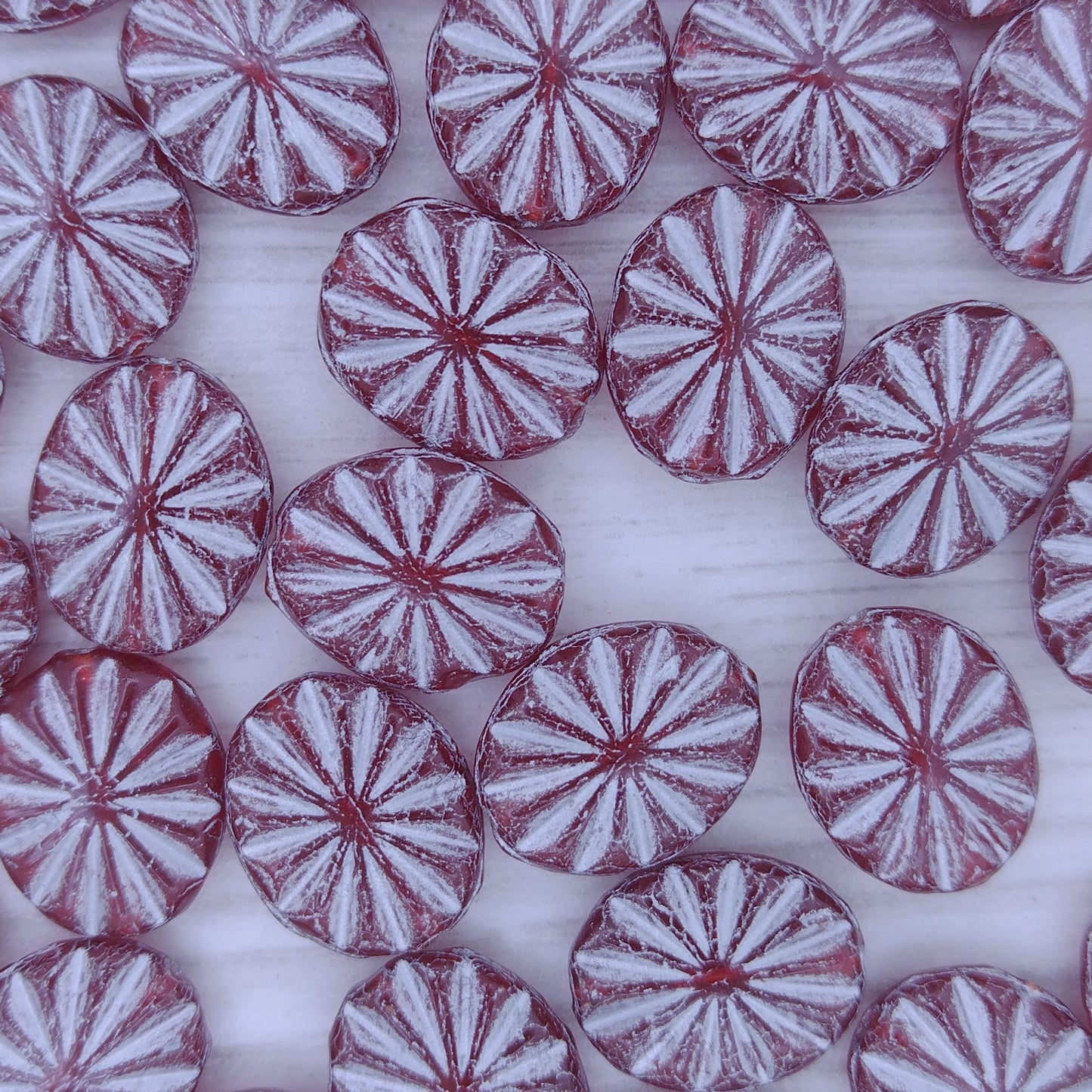 10 x flat ovals in Siam Red with Silver (14x12mm)