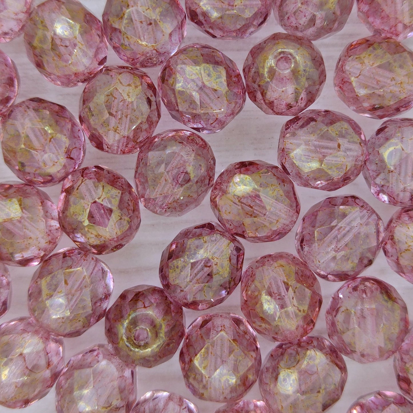 10 x 10mm faceted beads in Crystal/Terracotta Red