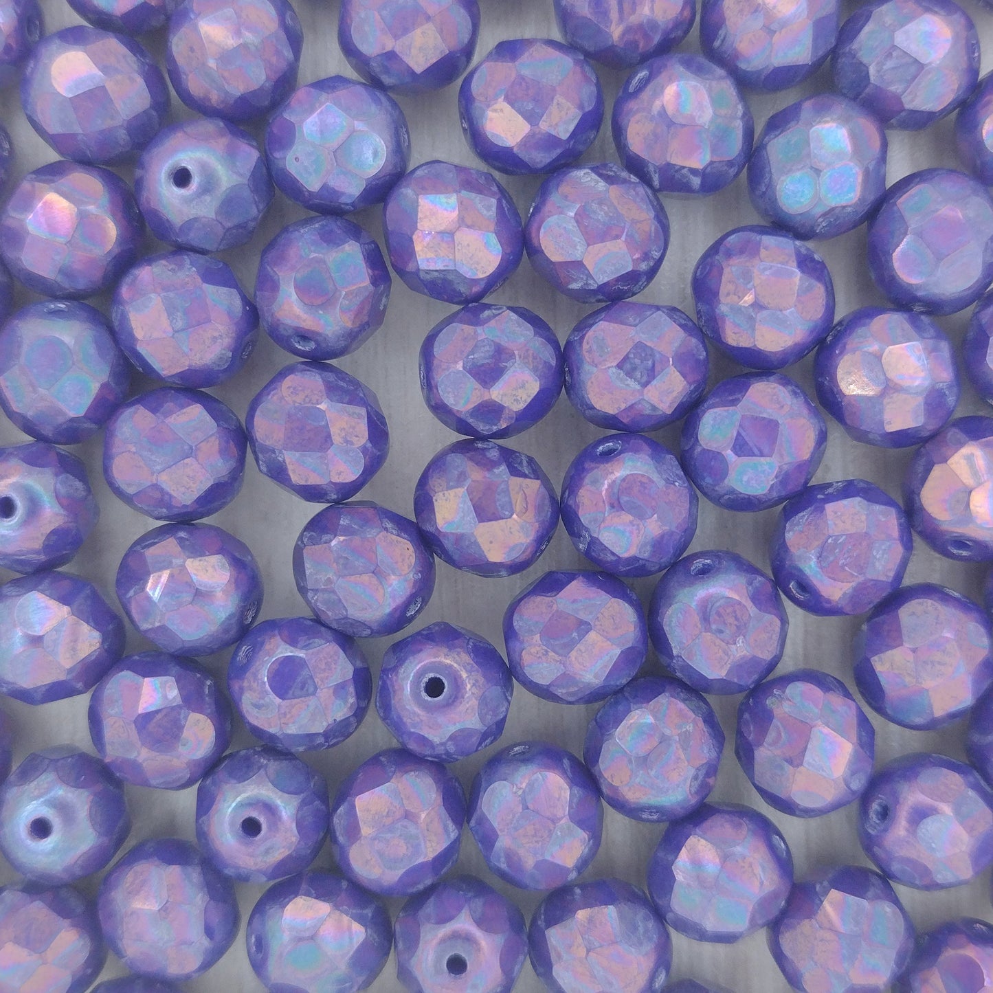 10 x 8mm faceted beads in Opaque Blue Nebula
