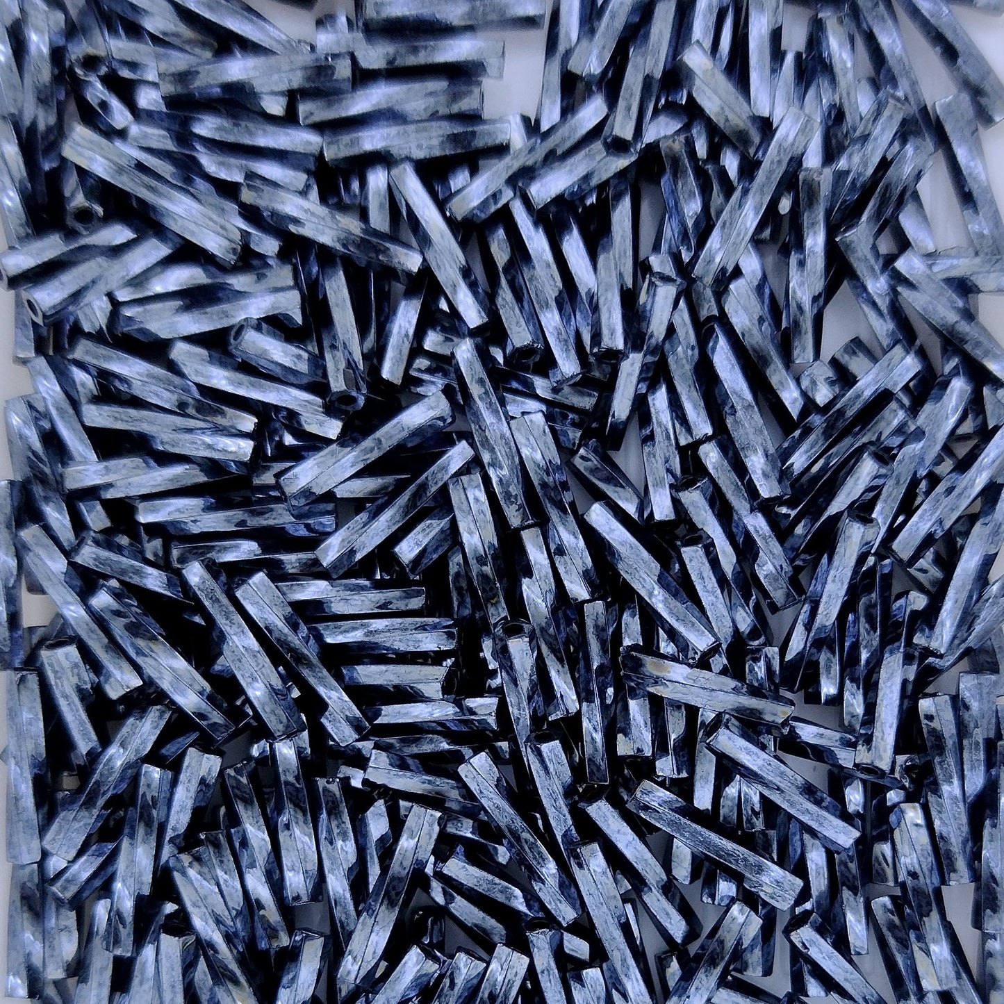 0451 - 10g x 9mm Miyuki Twisted Bugles in Gunmetal