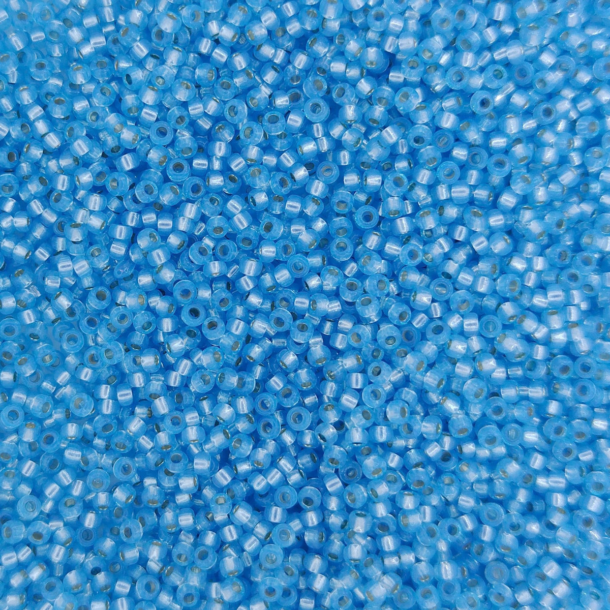 0573 - 5g Size 15/0 Miyuki seed beads in Silver lined Aqua