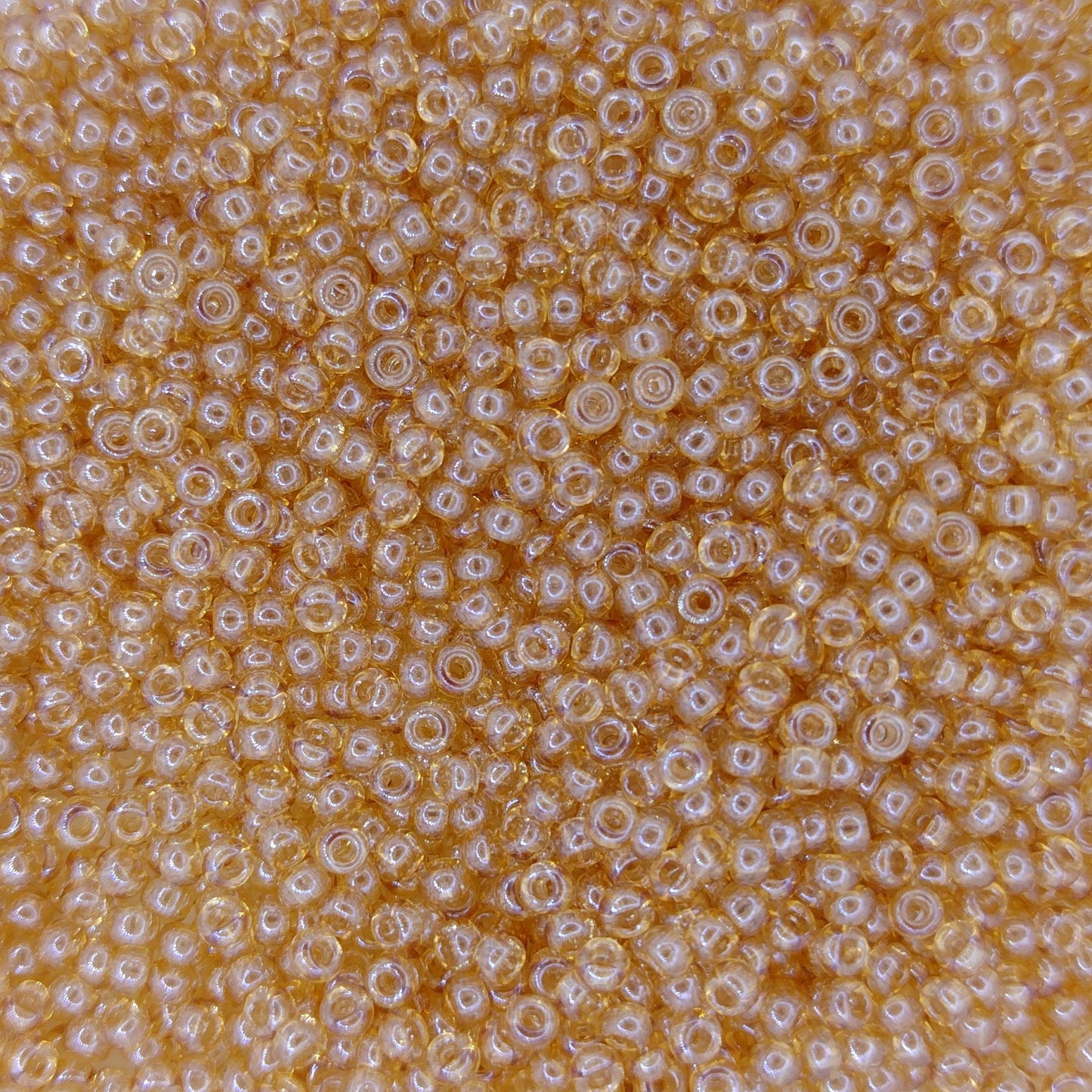 2439 - 10g Size 11/0 Miyuki seed beads in Transparent Smoky Gold Lustre