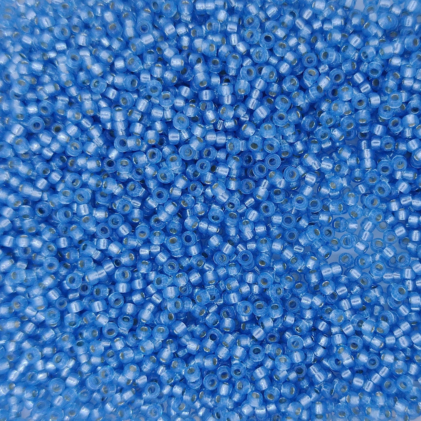 4242 - 25g Size 15/0 Miyuki seed beads in Duracoat Silver lined Aqua