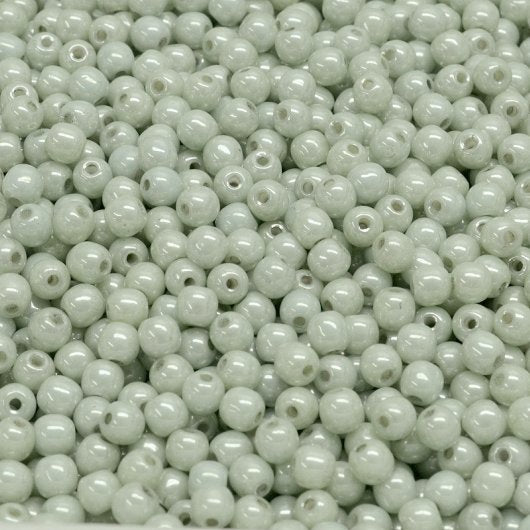 100 x 2mm round beads in Alabaster/Green Lustre