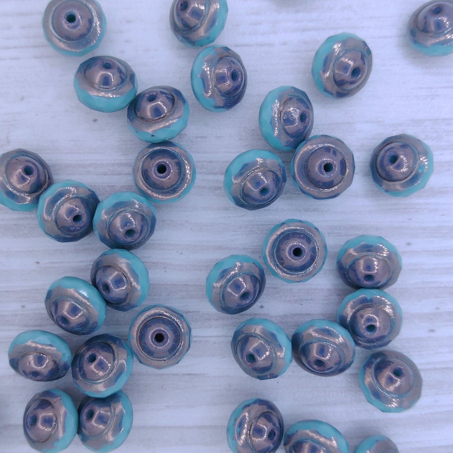 10 x Saturn beads in Turquoise with Bronze (6x8mm)