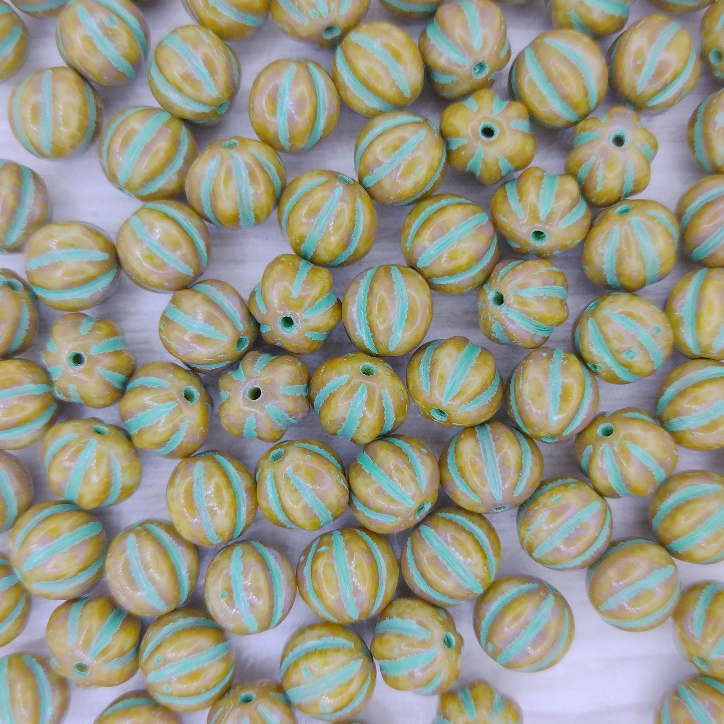 10 x 8mm melon beads in Opaque Brown with Green Turquoise