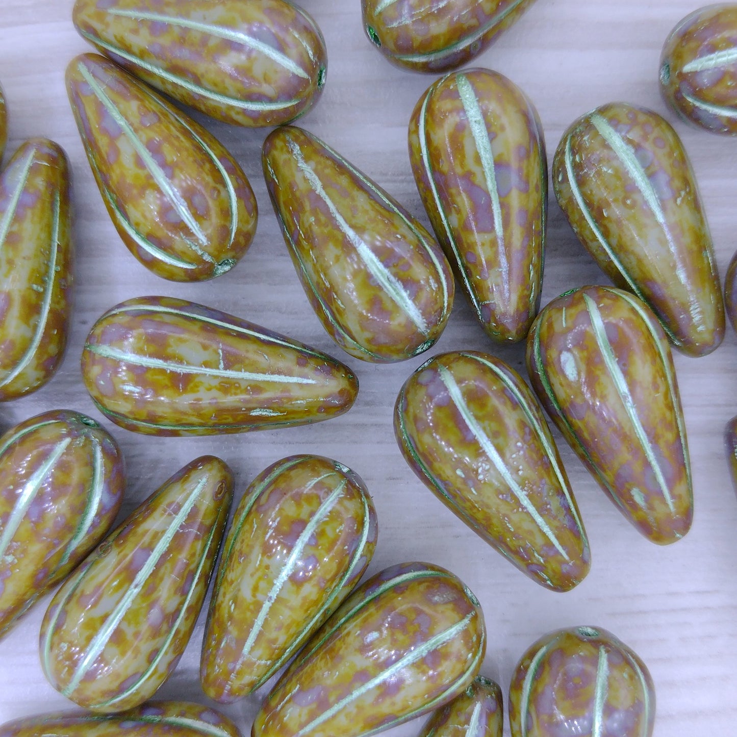 Pair of Melon drops in Green Picasso with Silver Green (22x11mm)