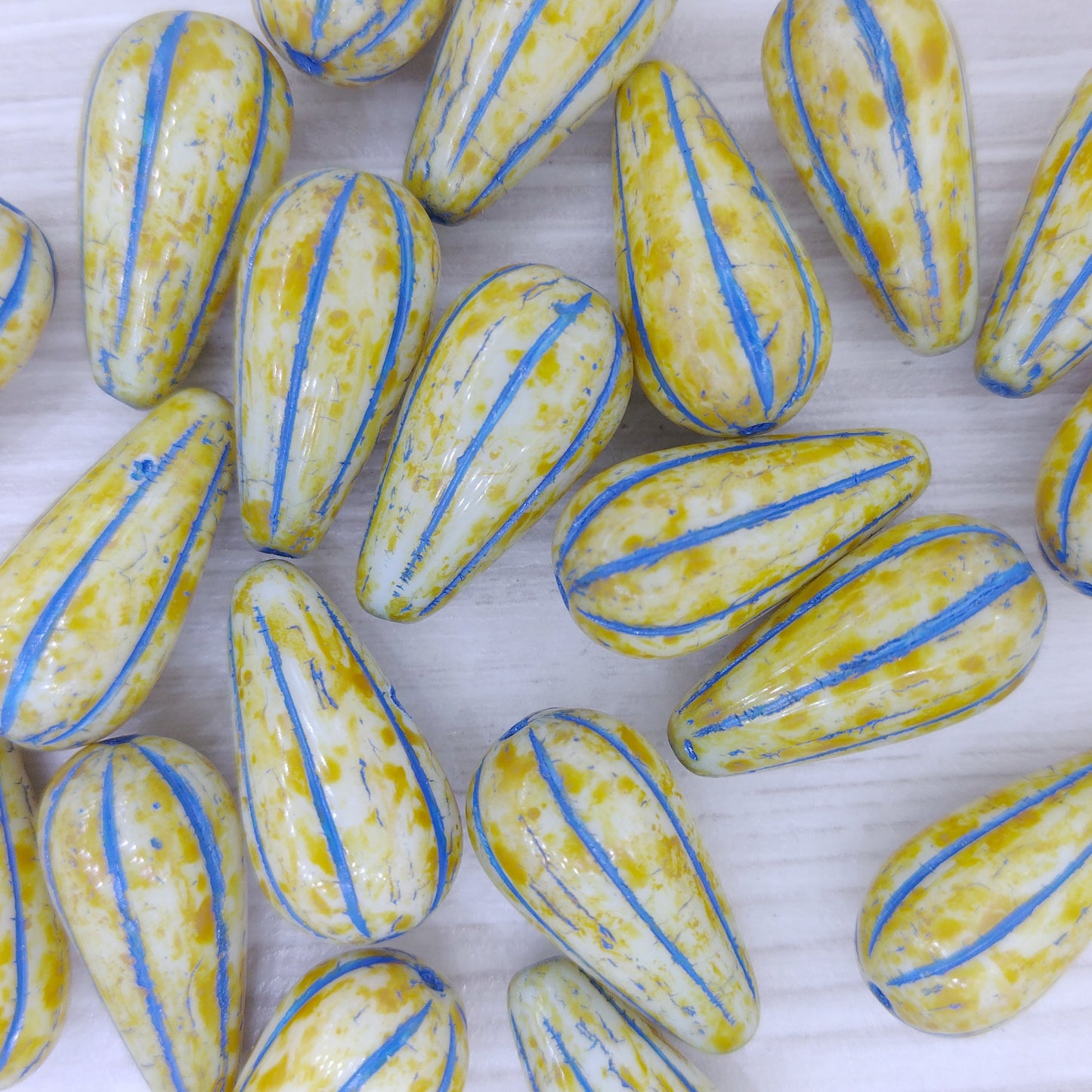 Pair of Melon drops in Alabaster Picasso with Blue (22x11mm)