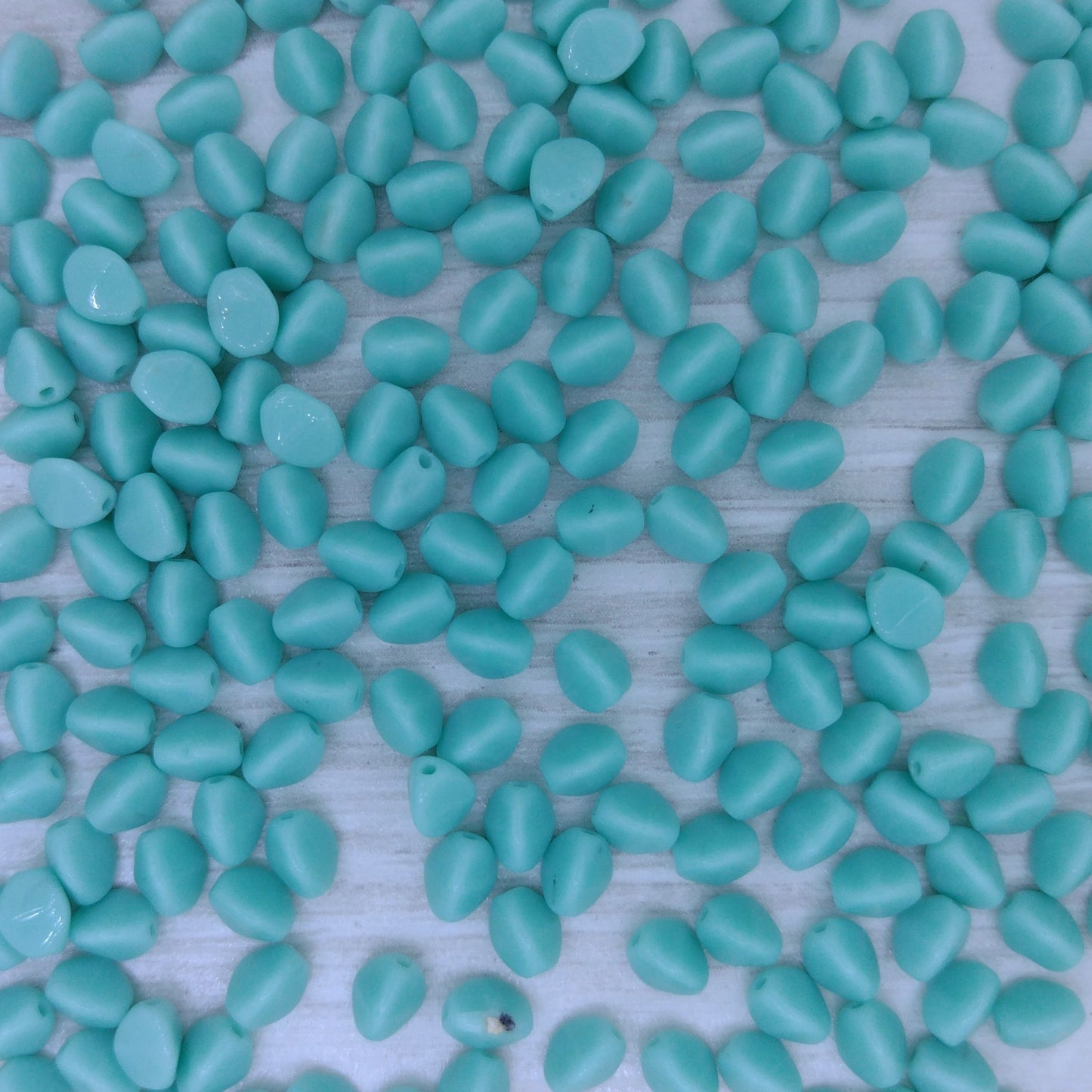 50 x pinch beads in Opaque Turquoise (3x5mm)