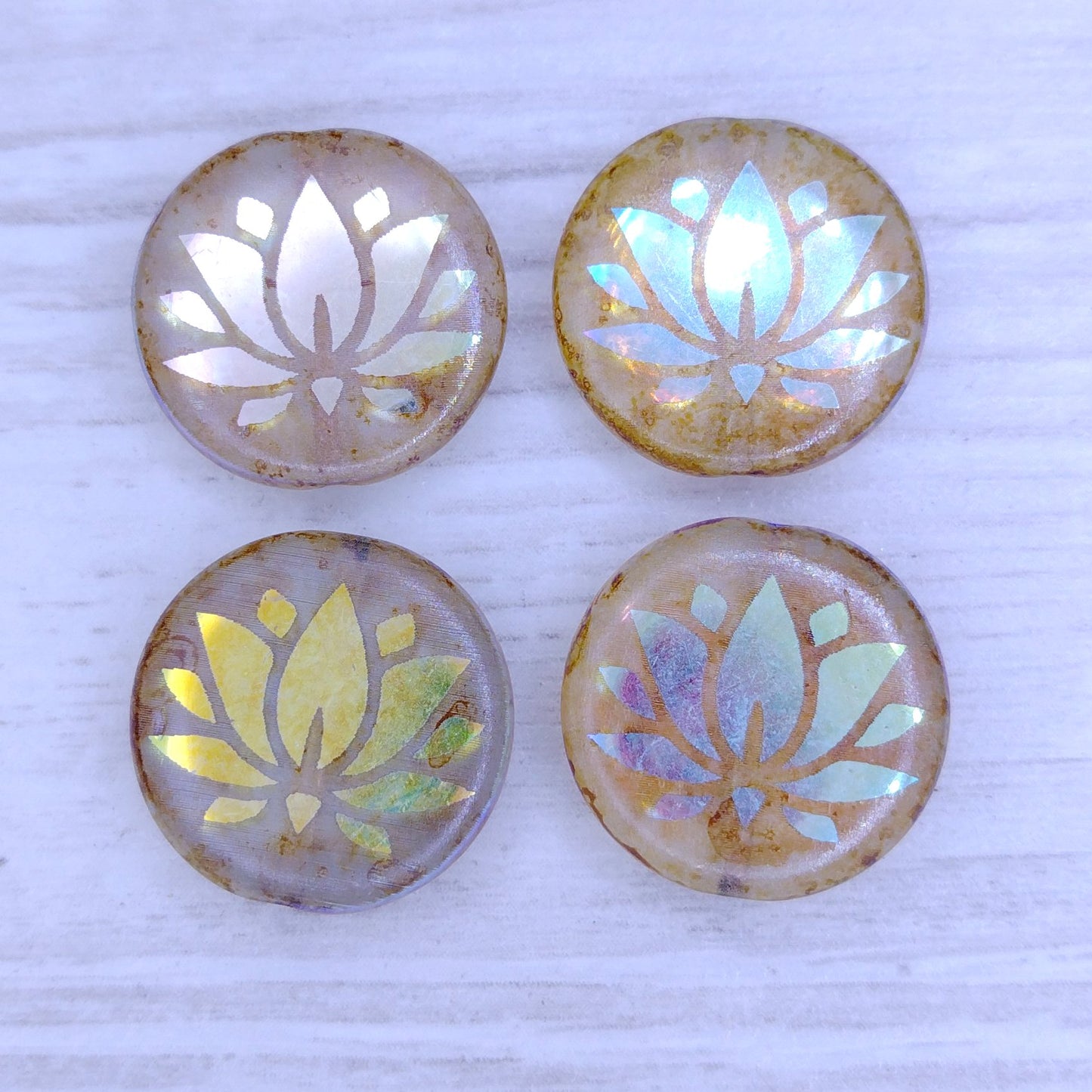 4 x 17mm disc beads in Crystal Picasso with laser etched Water Lily