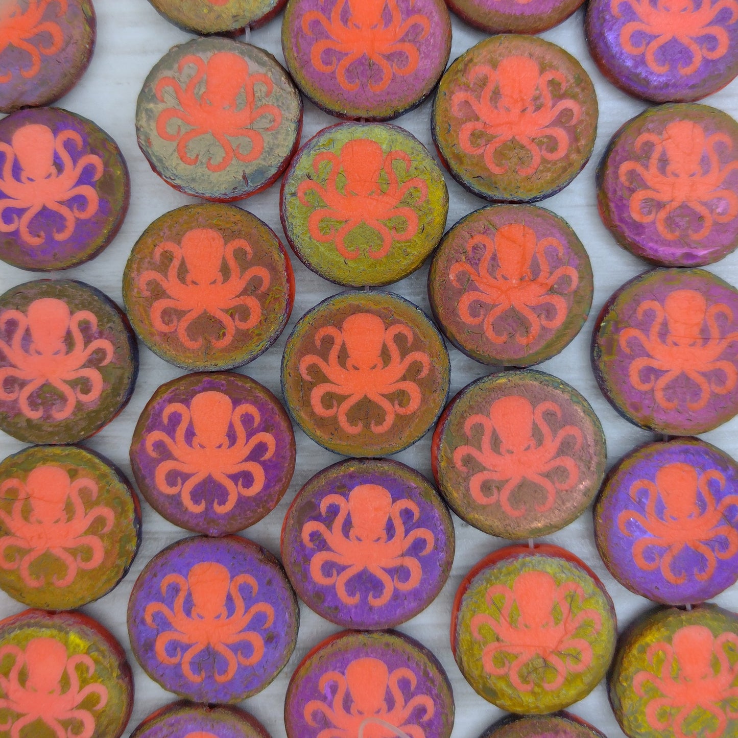 8 x 17mm round discs in etched Orange and laser etched Octopus