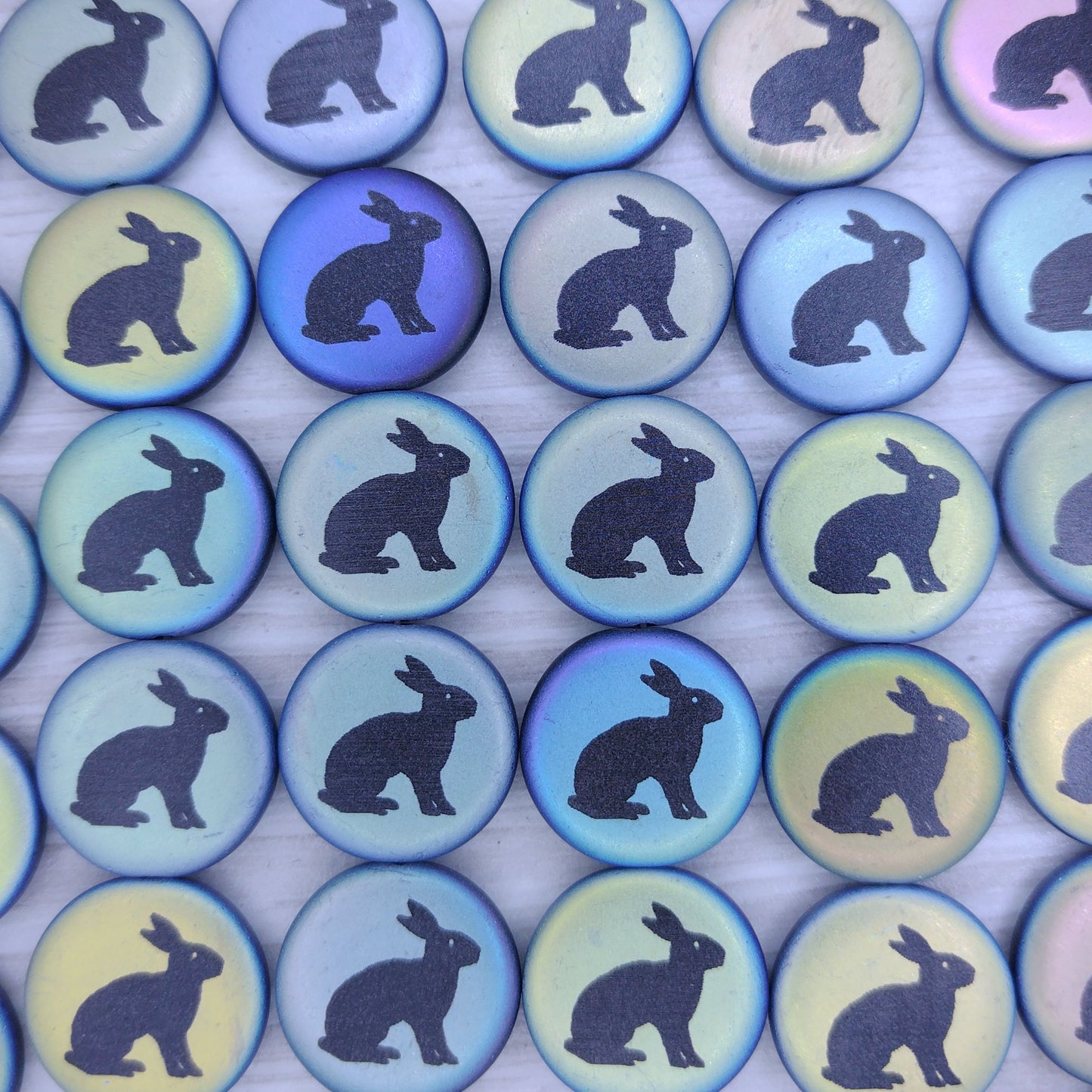 8 x 16mm disc bead in Matt Black with laser etched Rabbit