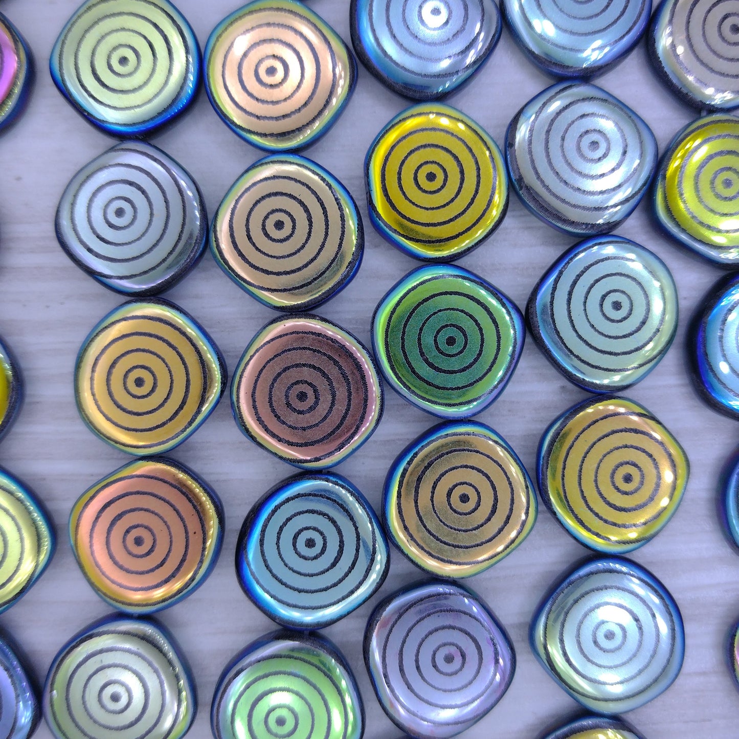 8 x 15mm irregular discs in Black with laser etched concentric circles