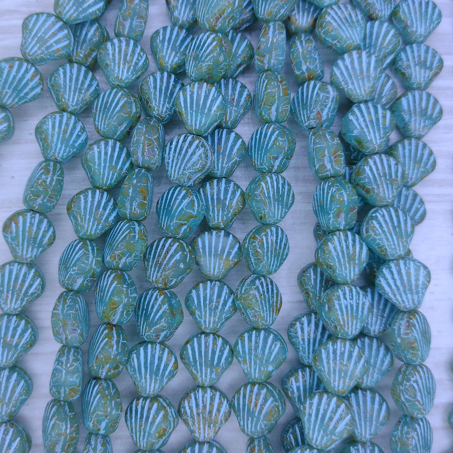 15 x 9mm shells in Turquoise Picasso with Turquoise