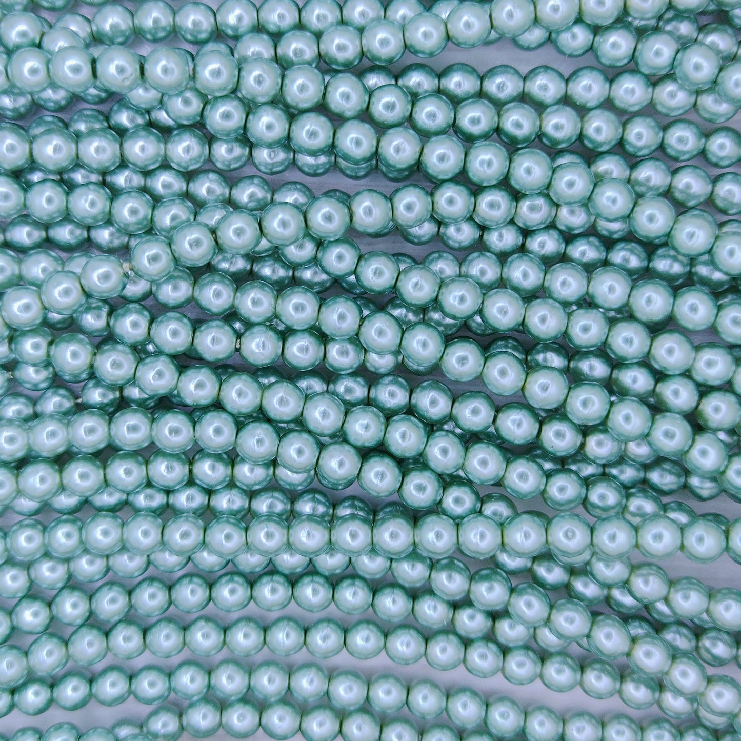 150 x 2mm round pearls in Sea Green