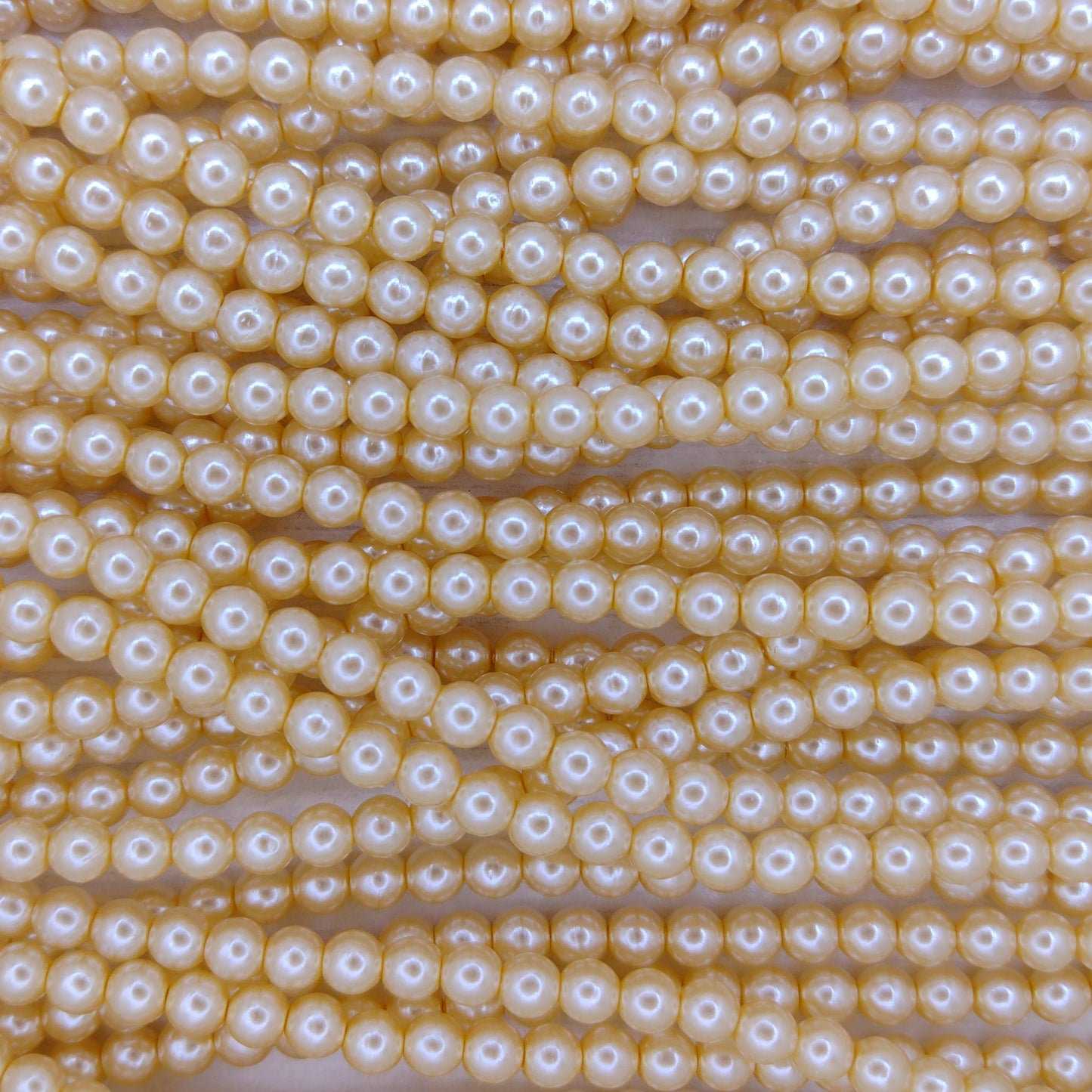 120 x 4mm round pearls in Dark Cream