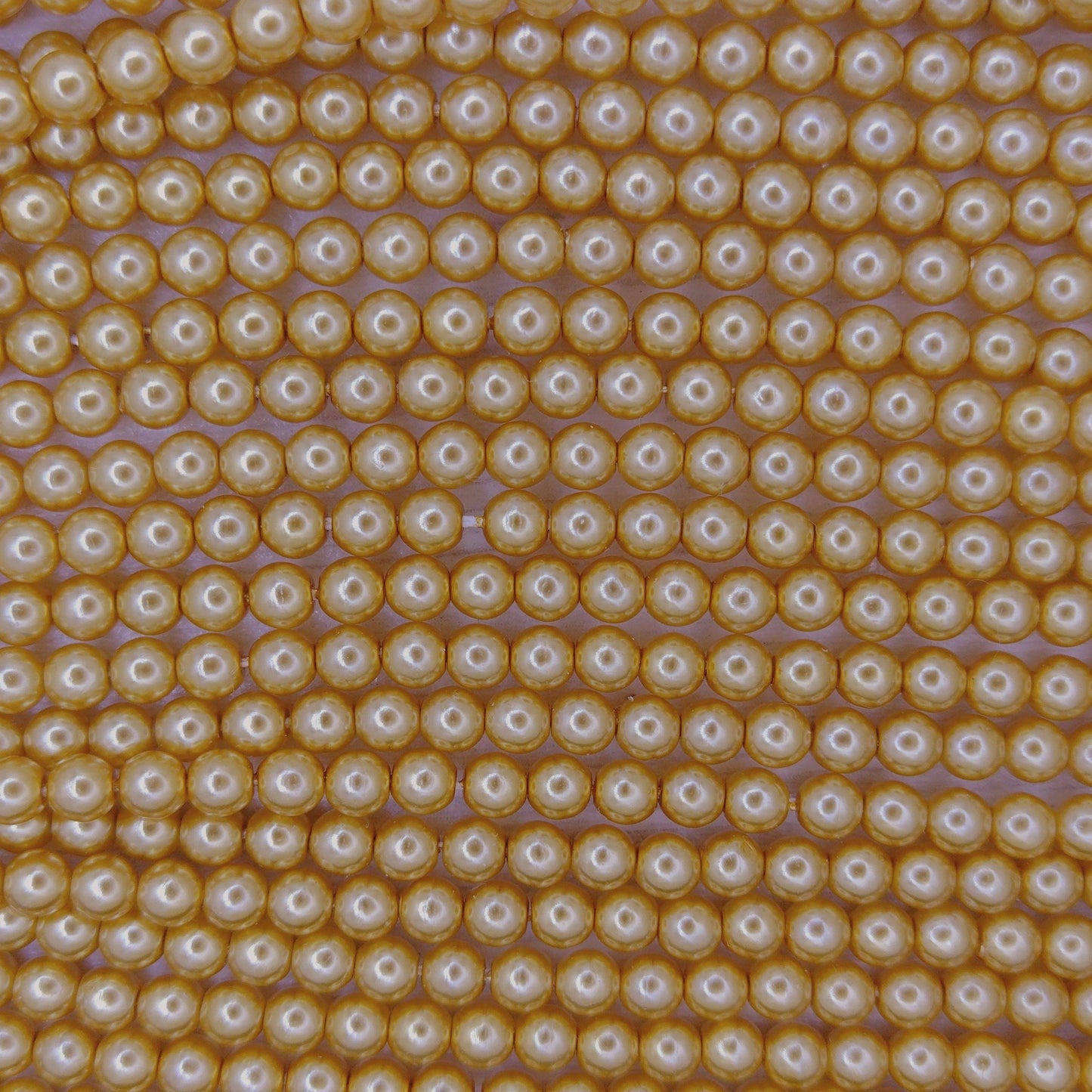 120 x 4mm round pearls in Gold