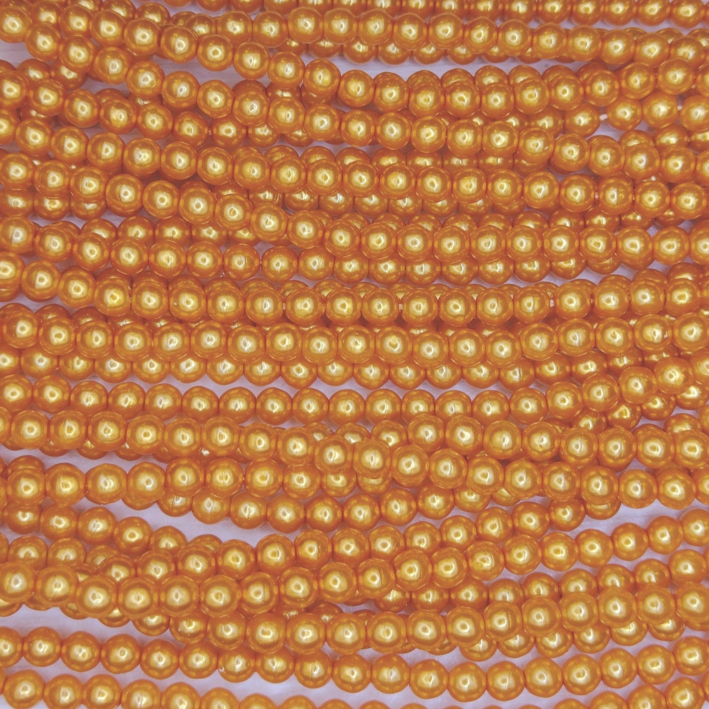 150 x 2mm round pearls in Orange