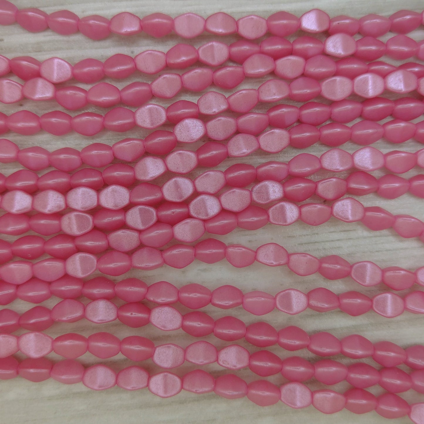 38 x pinch beads in Pastel Pink (3x5mm)