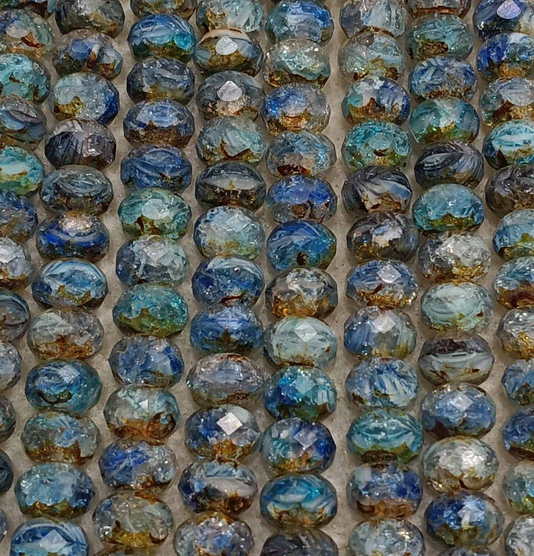 25 x faceted rondelles in Blue Marble Crackle (6x9mm)