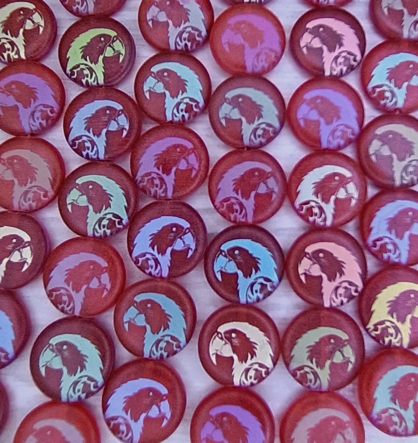 8 x 14mm disc in Matt Red with laser etched Parrot