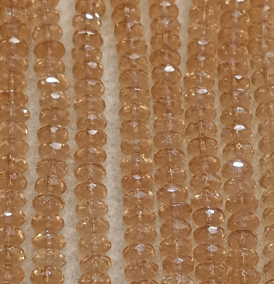 25 x faceted rondelles in Champagne Lustre (4x7mm)