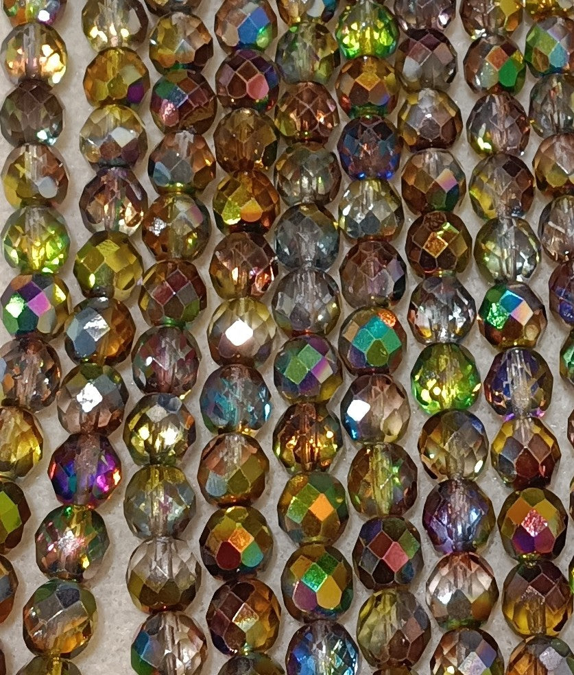 16 x 8mm faceted beads in Magic Green