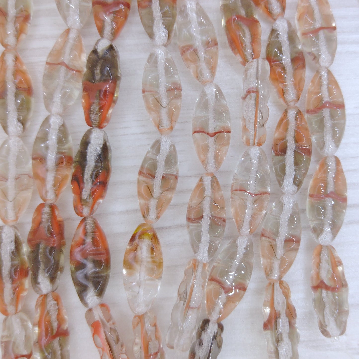 6 x Spindle beads in Crystal and Oranges mix (18x8mm)