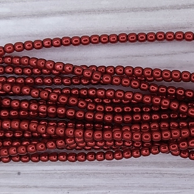 150 x 2mm round pearls in Red