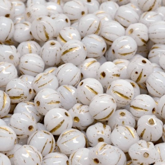 25 x 6mm melon beads in Alabaster with Gold
