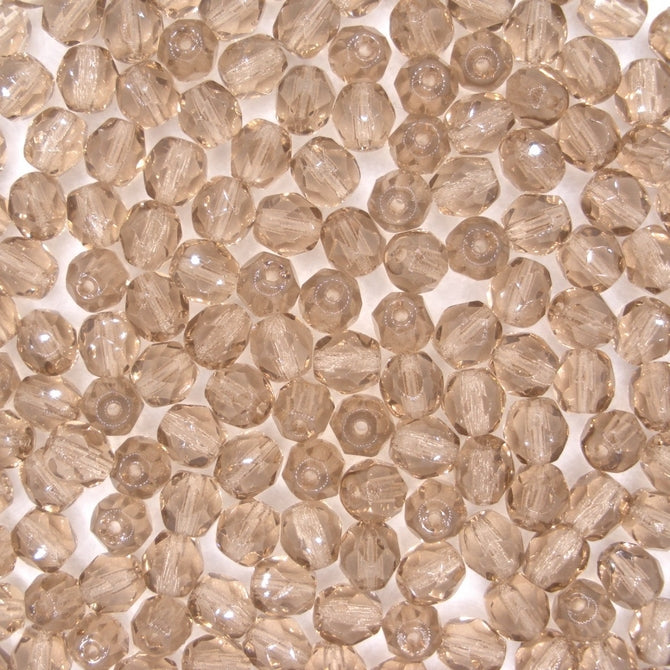 50 x 6mm faceted beads in Light Colorado Topaz