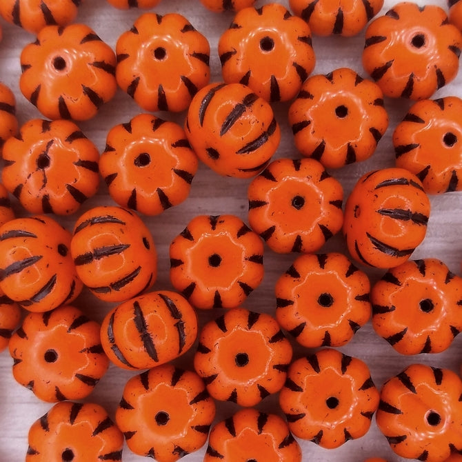 Pair of pumpkin beads in Orange/Black (8x11mm)