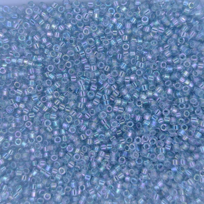 DB0110 - 1g Size 11/0 delicas in Transparent Light Marine Blue Gold Lustre
