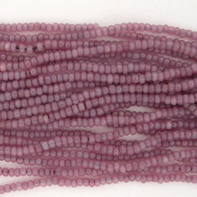 1 string of Size 13/0 Czech charlottes in Light Topaz/Rose Lustre