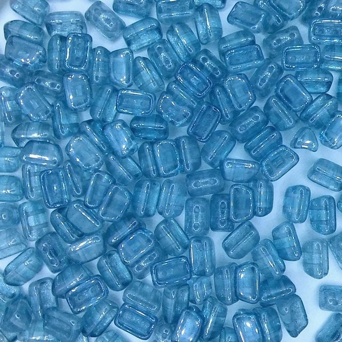 25 x Roofy beads in Crystal/Blue Lustre