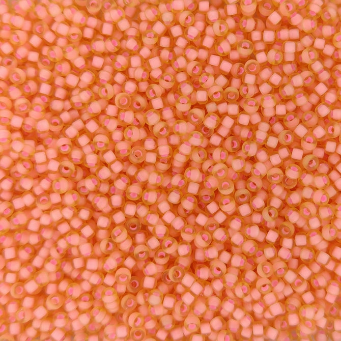1935 - 10g Size 11/0 Miyuki seed beads in S/F Salmon lined Light Topaz