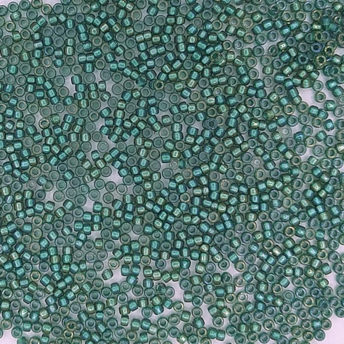 0270 - 5g Size 15/0 Toho seed beads in Metallic Teal lined Crystal