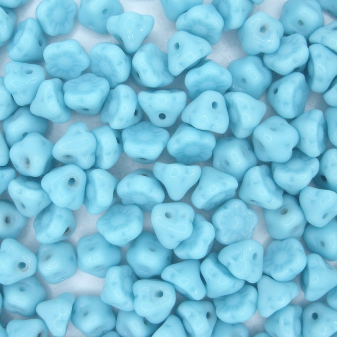 10 x 7mm top drilled flowers in Turquoise