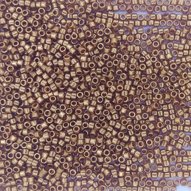 DB0115 - 5g Size 11/0 delicas in Dark Topaz Gold Lustre
