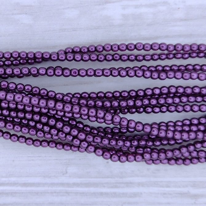 150 x 2mm round pearls in Purple